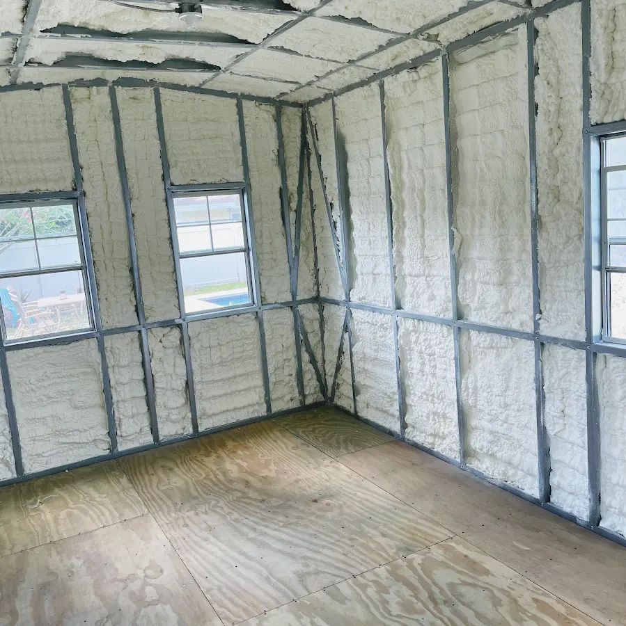 Closed-cell spray foam insulation applied to wall cavities in a residential project in Vermillion